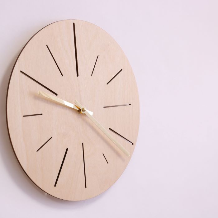 Wall clock made of natural wood