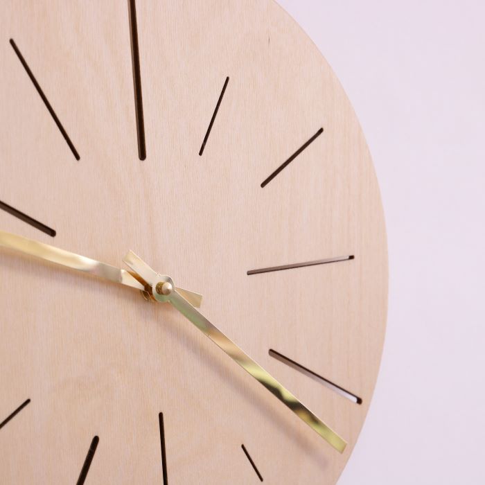 Wall clock made of natural wood