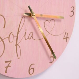 Wall clock with engraving