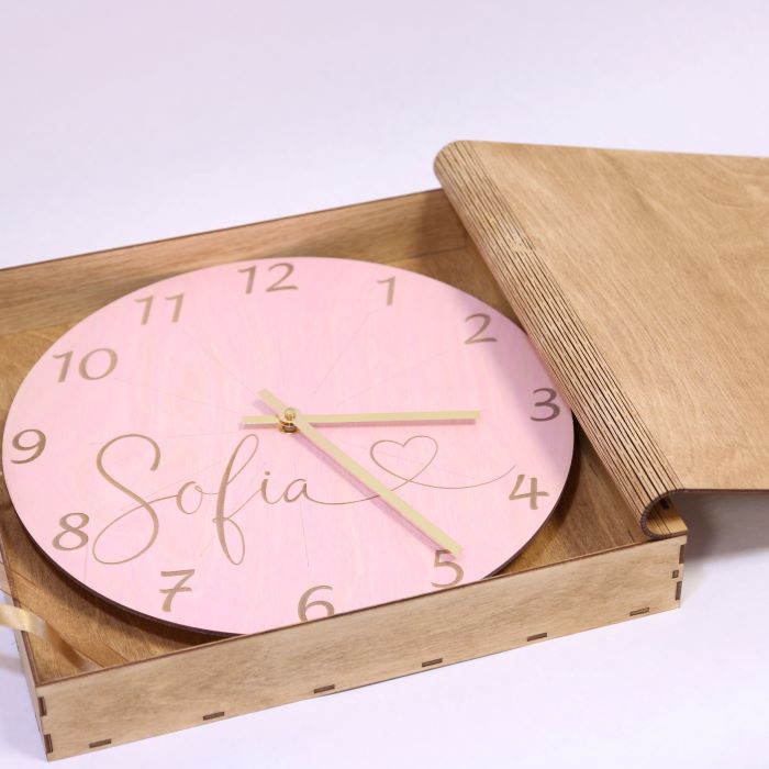 Wall clock with engraving