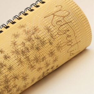 Notebook with wooden flexible covers